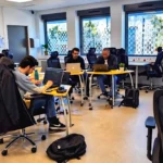 Students working in an AI2 classroom