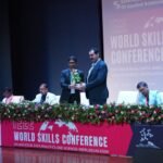 Yacine Aslimi delivering a keynote at the IEEE World Skills Conference, Symbiosis University of Applied Sciences, Indore
