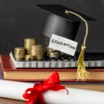 Graduation cap on an education savings jar, books and diploma