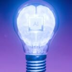Artificial intelligence concept: light bulb with a glowing brain and AI chip
